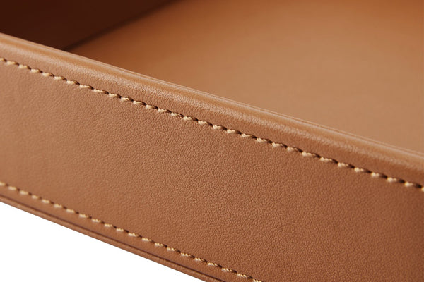 der Rahmen aus Kunstleder der quadratischen Schale