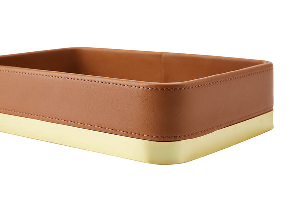 Seitenansicht der braunen Schale, außen Kunstleder, unten mit breitem goldenem Metallrand